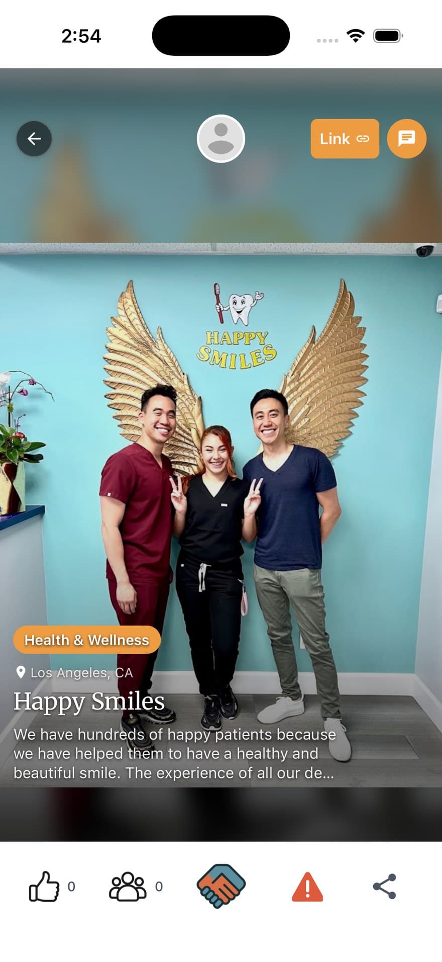 A Qollaby business page for a local dental practice, showing the team, the health and wellness category, the city, and a button to message them